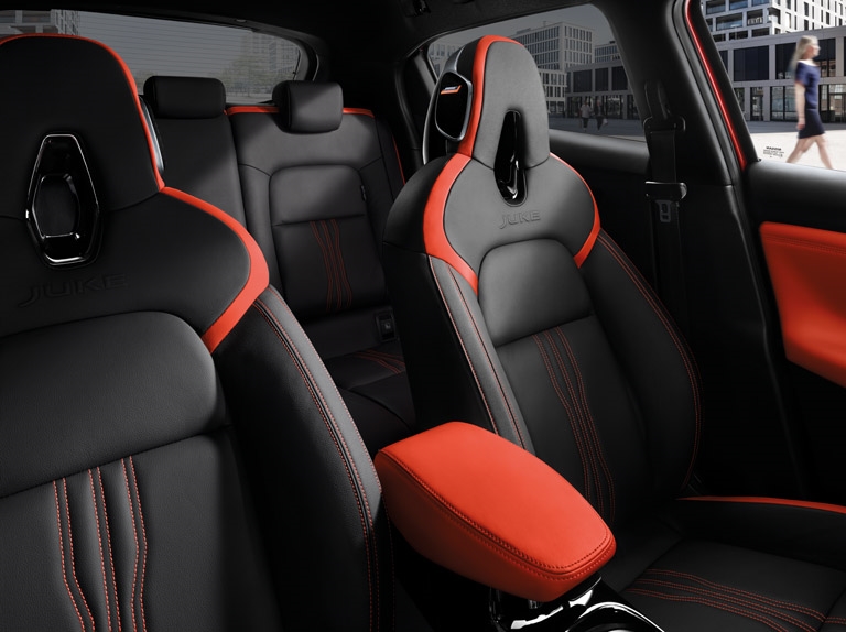 Premium monoform sports seats with partial leather and synthetic leather upholstery (orange)
