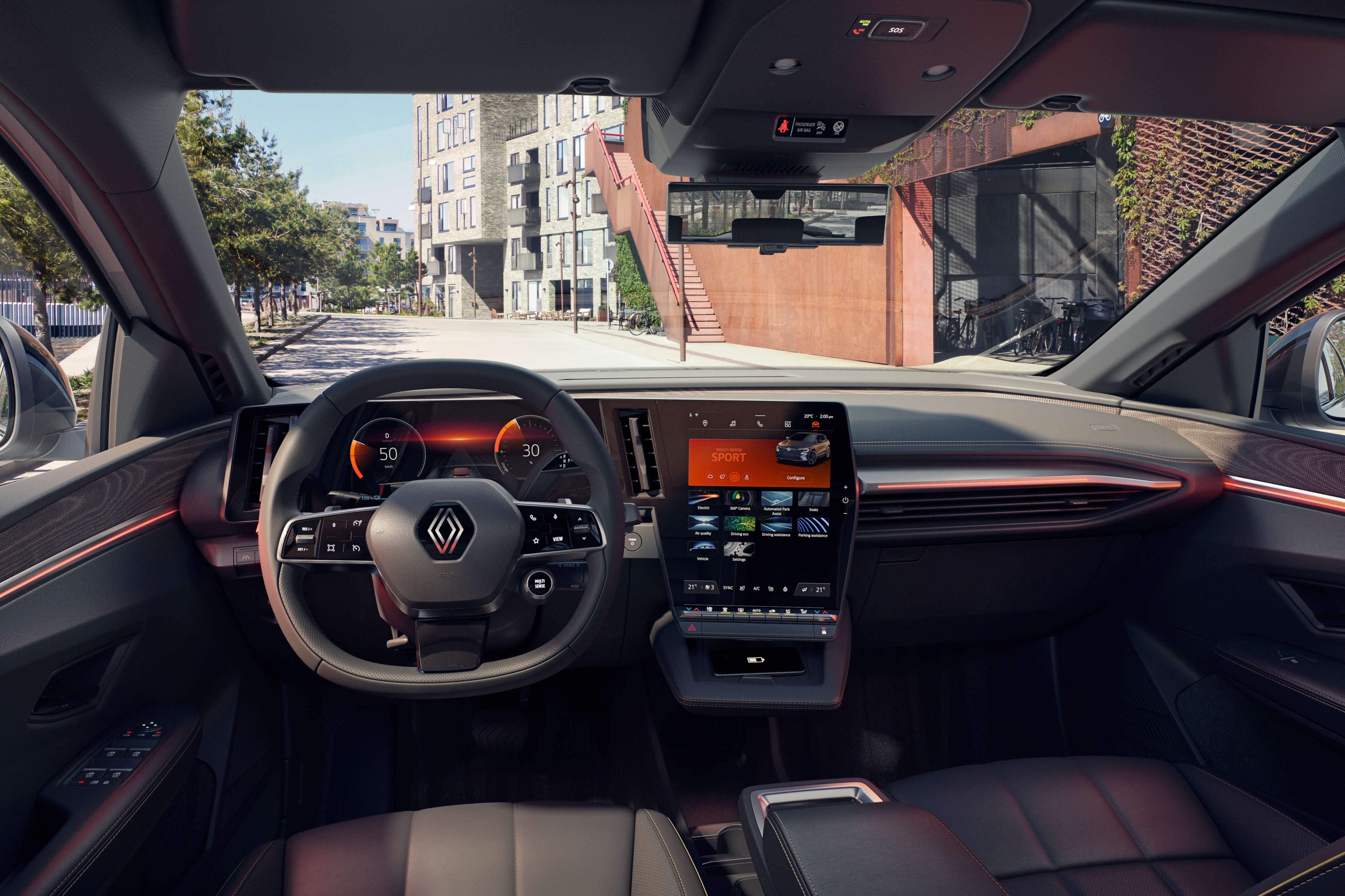 Visiškai elektrinio Renault MEGANE E-TECH Electric interjeras, matomas vairas, prietaisų skydas ir OpenR ekranas